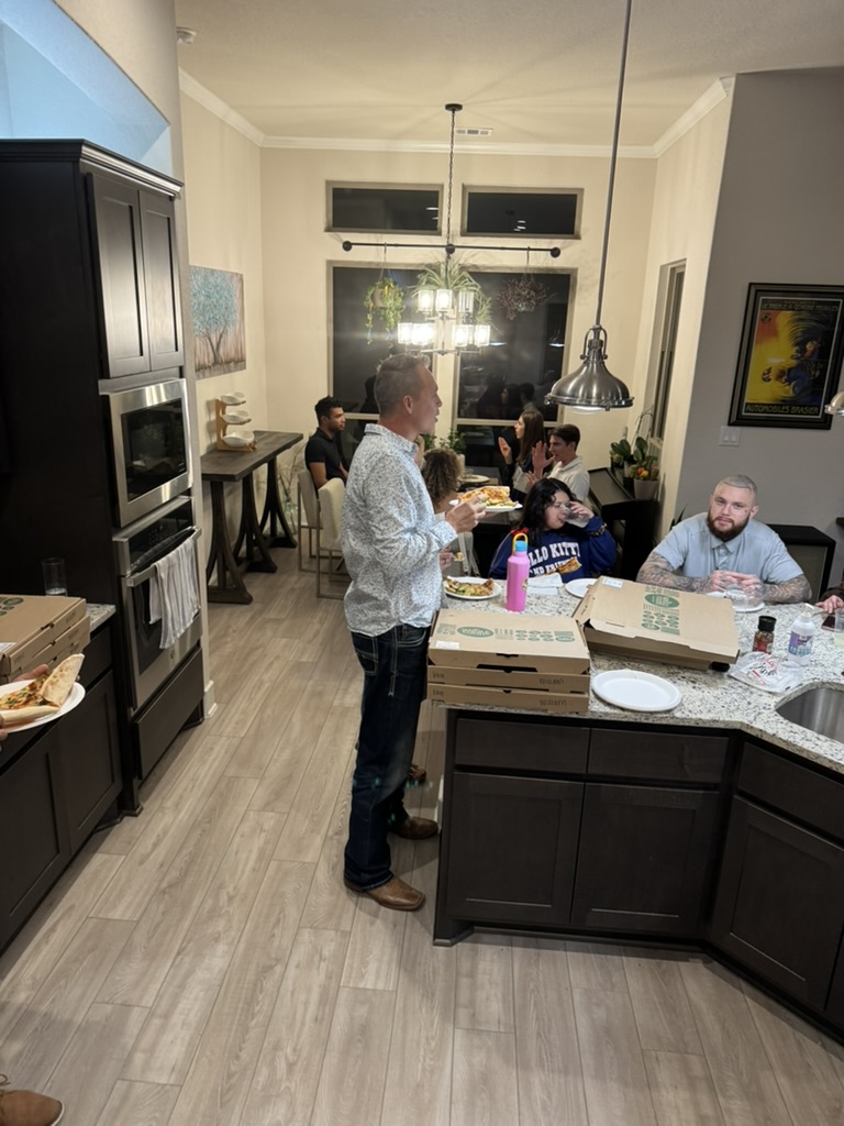 Jesus People 2.0 sharing a meal in a kitchen